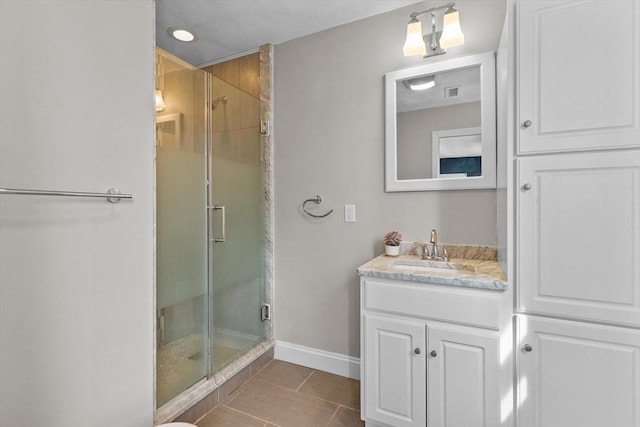 12 School St Unit 3, Salem, MA 01970 - full bath with a stall shower, vanity, tile patterned floors, baseboards, and recessed lighting