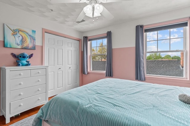 12 School St Unit 3, Salem, MA 01970 - bedroom featuring dark wood-type flooring, a closet, and a ceiling fan