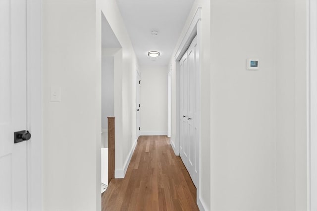 hallway featuring light wood-type flooring