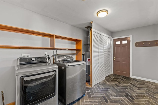 laundry room featuring washer and clothes dryer