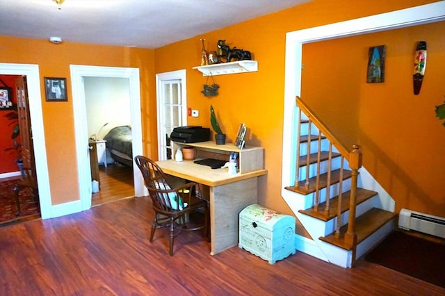 office space with hardwood / wood-style flooring and a baseboard radiator