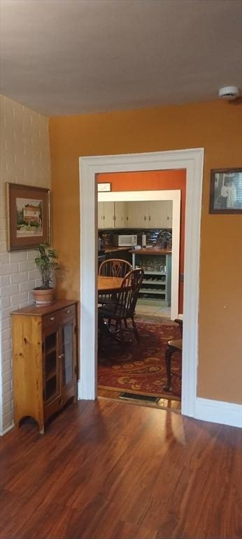 hall featuring dark hardwood / wood-style floors