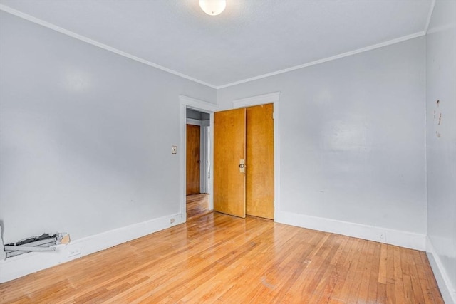 127-129 Blue Hills Pkwy, Milton, MA 02186 - spare room featuring light wood finished floors and ornamental molding