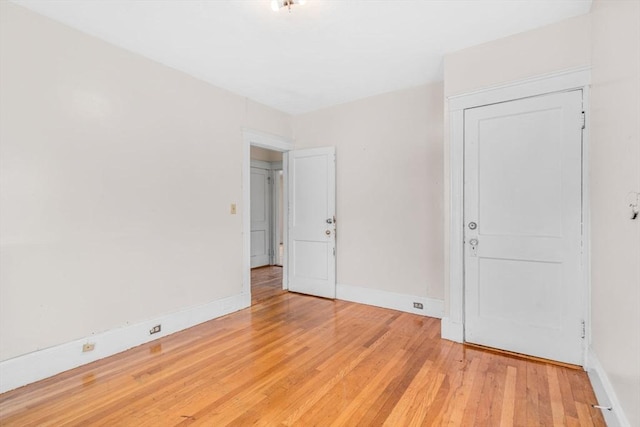 127-129 Blue Hills Pkwy, Milton, MA 02186 - spare room featuring light wood-style flooring and baseboards