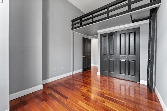 unfurnished bedroom with wood-type flooring