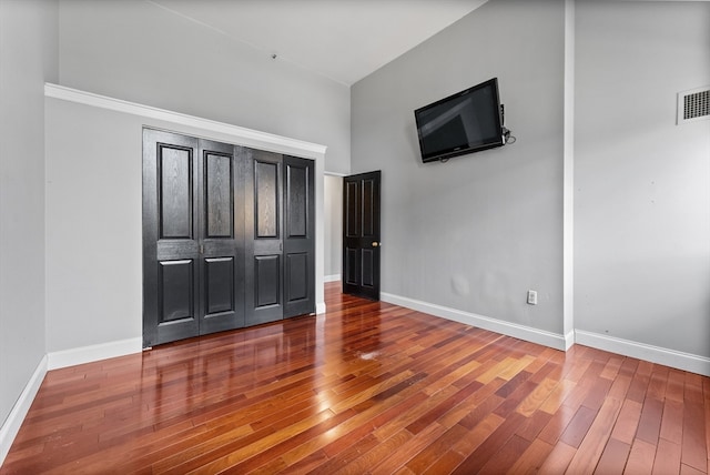 unfurnished bedroom with wood-type flooring