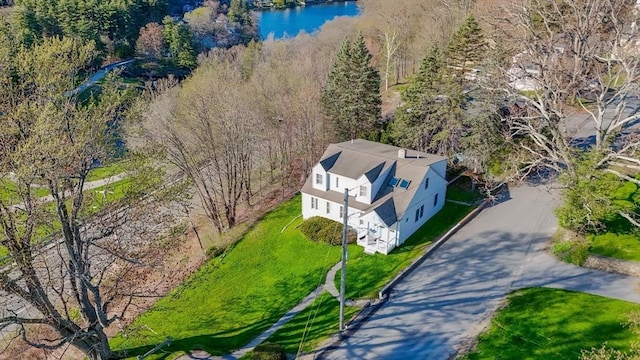 bird's eye view featuring a forest view