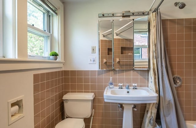 203 State St, Northampton, MA 01060 - bathroom featuring tile walls, a shower with curtain, toilet, and a sink