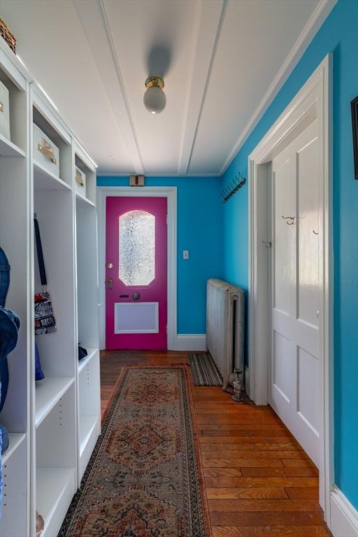 203 State St, Northampton, MA 01060 - mudroom with radiator heating unit and wood finished floors