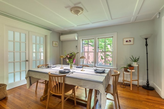 203 State St, Northampton, MA 01060 - dining room with light wood-type flooring, a wall mounted air conditioner, and baseboards