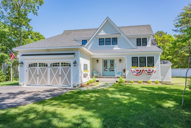 79 Neshobe Rd, Mashpee, MA 02649 - shingle-style home featuring french doors, an attached garage, asphalt driveway, and a shingled roof