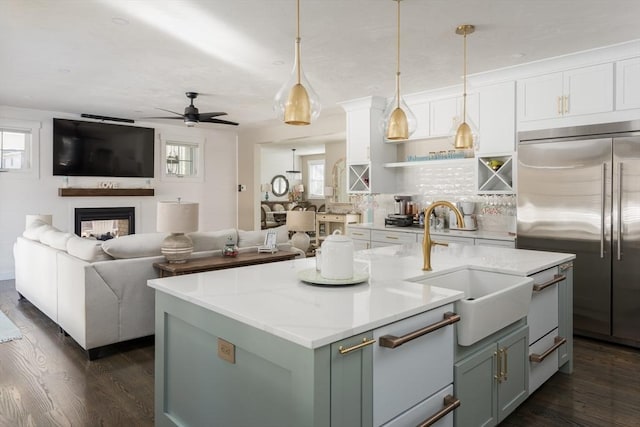 79 Neshobe Rd, Mashpee, MA 02649 - kitchen with stainless steel built in refrigerator, open floor plan, and dark wood-type flooring