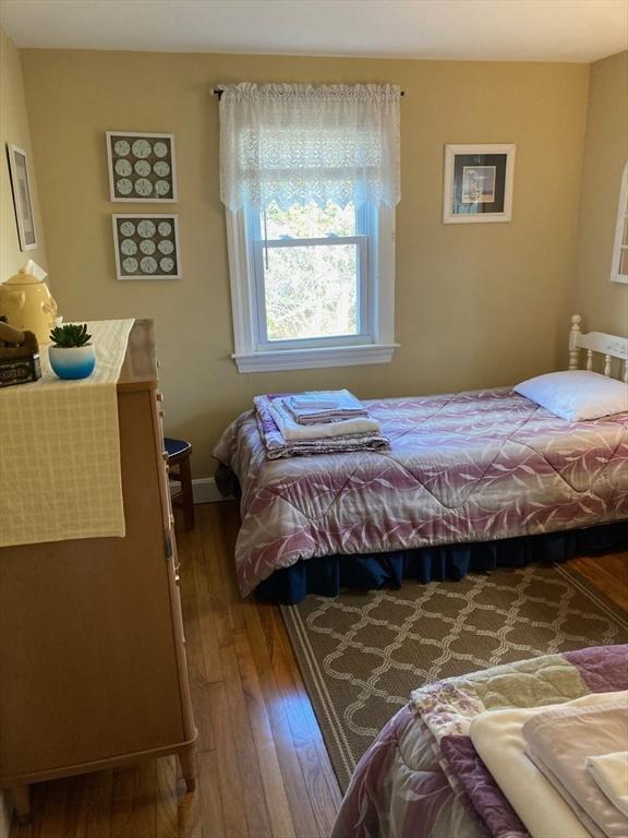 bedroom with wood-type flooring