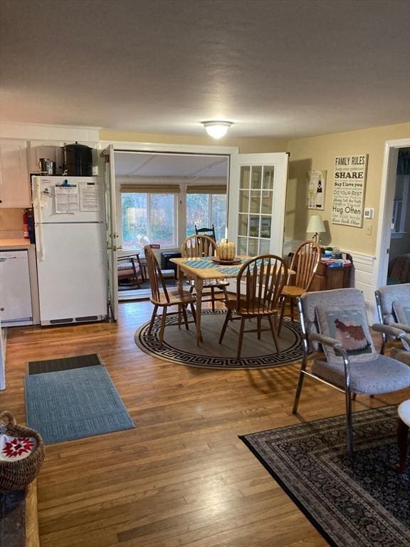 dining space featuring hardwood / wood-style flooring