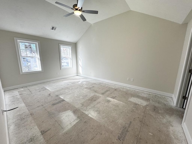 unfurnished room featuring lofted ceiling and ceiling fan