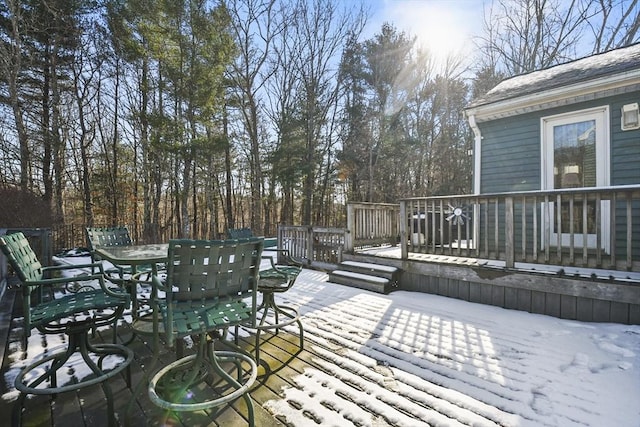 view of snow covered deck