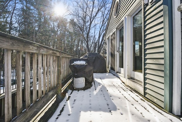 view of snow covered deck