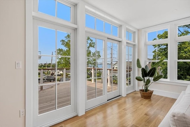 34 Otis Hill Rd, Hingham, MA 02043 - doorway featuring healthy amount of natural light, wood finished floors, and baseboards