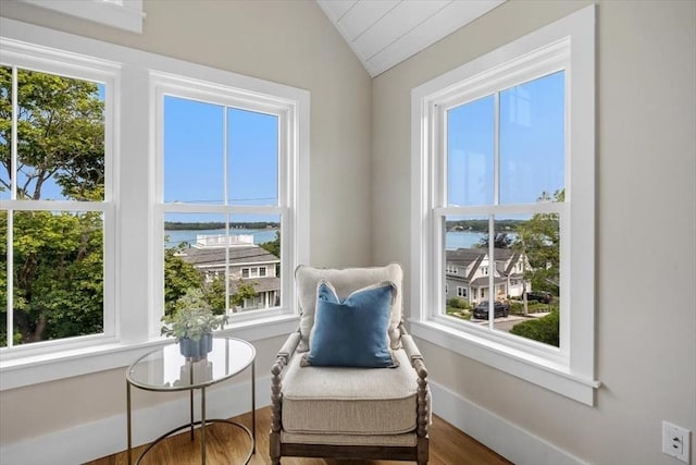 34 Otis Hill Rd, Hingham, MA 02043 - sitting room featuring healthy amount of natural light, a water view, lofted ceiling, and wood finished floors