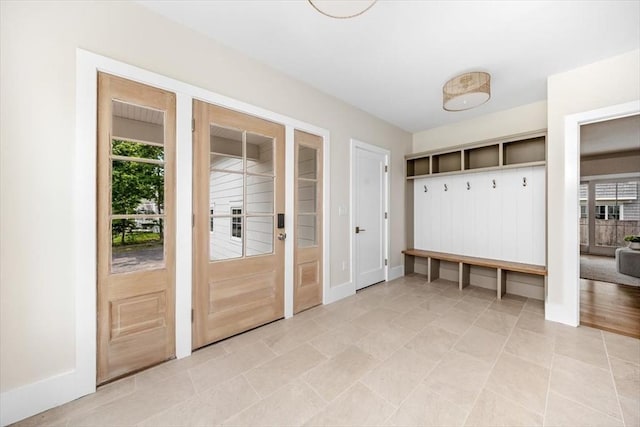 34 Otis Hill Rd, Hingham, MA 02043 - mudroom featuring healthy amount of natural light and baseboards