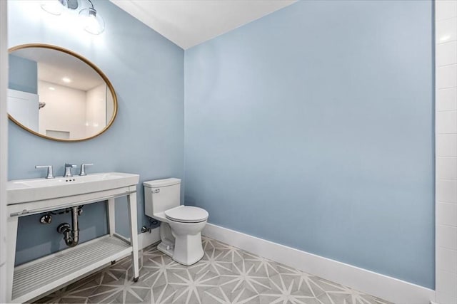 34 Otis Hill Rd, Hingham, MA 02043 - bathroom with toilet and baseboards