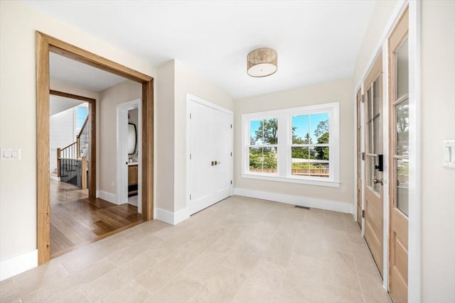 34 Otis Hill Rd, Hingham, MA 02043 - entrance foyer with stairs, baseboards, and light tile patterned flooring