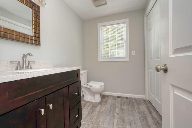 2 Dalton Ter, Holbrook, MA 02343 - bathroom with vanity and wood finished floors