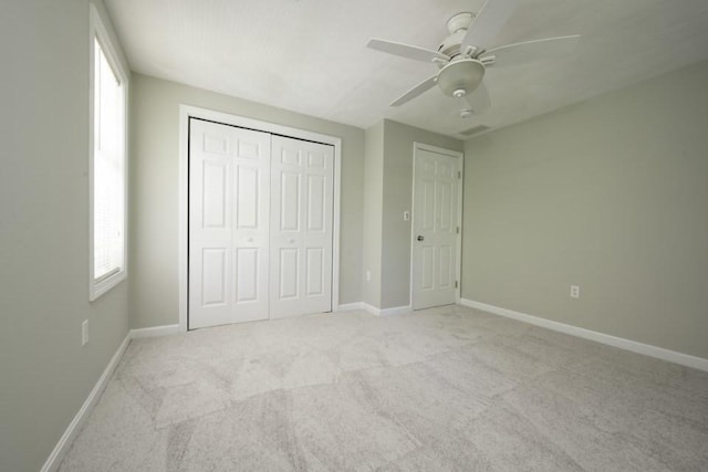 2 Dalton Ter, Holbrook, MA 02343 - unfurnished bedroom with light colored carpet, a closet, multiple windows, and a ceiling fan
