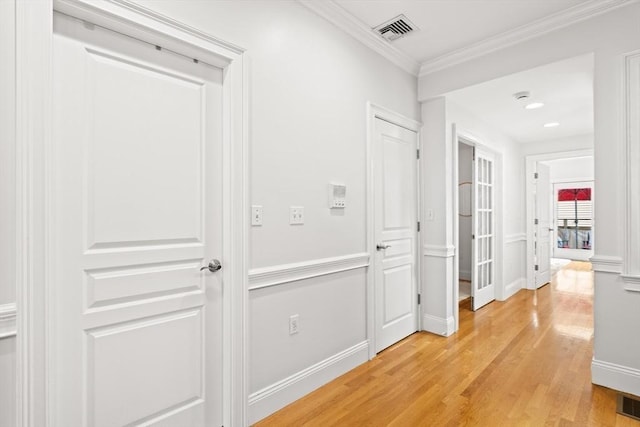53 Woodward St Unit 2, Boston, MA 02127 - hall with light wood-type flooring, crown molding, and baseboards