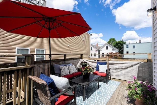 53 Woodward St Unit 2, Boston, MA 02127 - wooden terrace with an outdoor hangout area