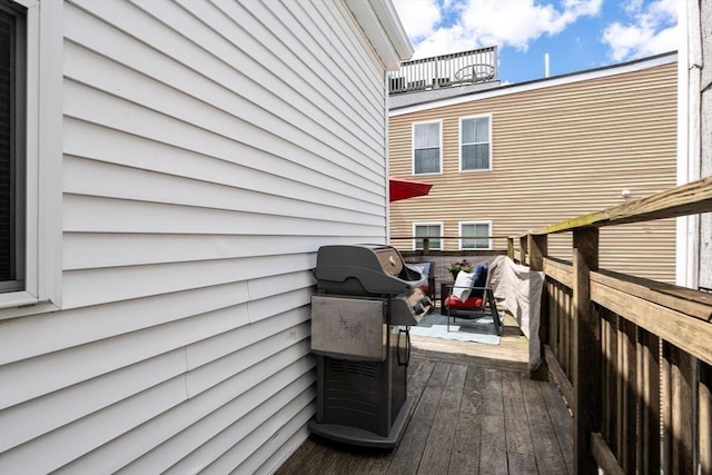 53 Woodward St Unit 2, Boston, MA 02127 - wooden terrace featuring a grill