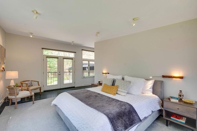 bedroom featuring access to outside and french doors