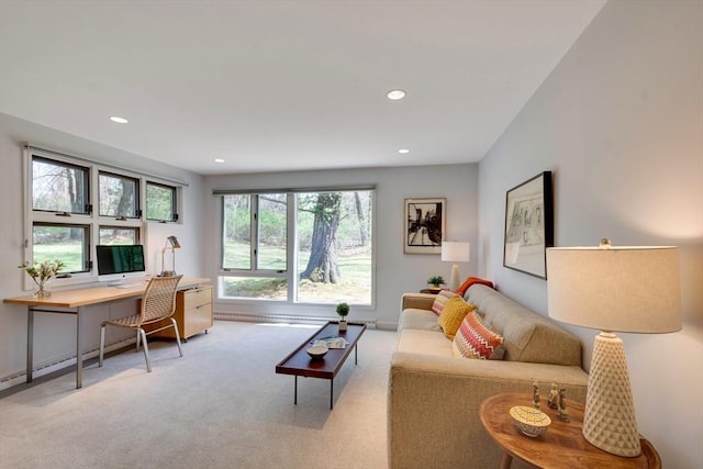 carpeted living room featuring recessed lighting and baseboards
