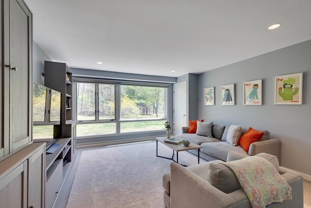living room featuring carpet floors and recessed lighting