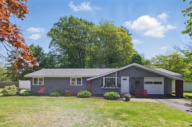 15 Temi Rd, Beverly, MA 01915 - ranch-style house featuring an attached garage, asphalt driveway, and a chimney