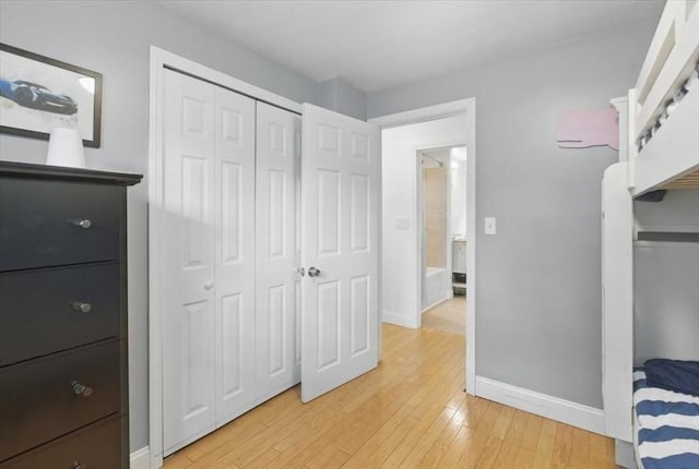 15 Temi Rd, Beverly, MA 01915 - unfurnished bedroom with light wood-style floors, baseboards, and a closet