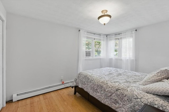15 Temi Rd, Beverly, MA 01915 - bedroom with baseboard heating and light wood-type flooring