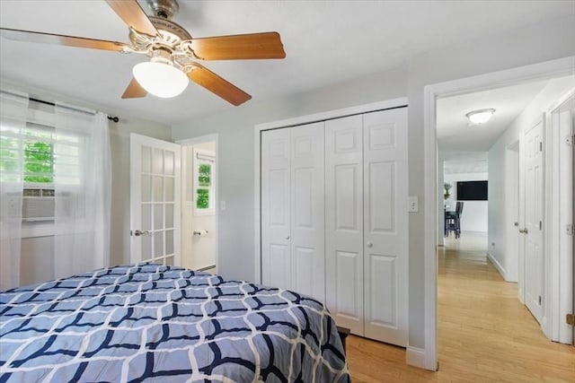 15 Temi Rd, Beverly, MA 01915 - bedroom with light wood finished floors, a closet, multiple windows, and a ceiling fan