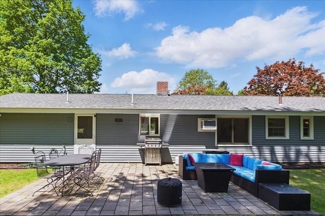 15 Temi Rd, Beverly, MA 01915 - back of property featuring outdoor lounge area, a patio area, a chimney, and outdoor dining space