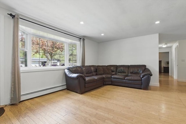 15 Temi Rd, Beverly, MA 01915 - living room with a baseboard radiator, light wood-style flooring, recessed lighting, and baseboards