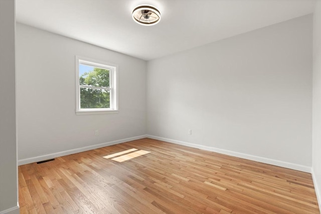 651 S Main St, Randolph, MA 02368 - spare room with baseboards and light wood-type flooring