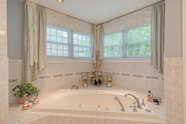 244 Salem End Rd, Framingham, MA 01702 - bathroom featuring a whirlpool tub and a wainscoted wall