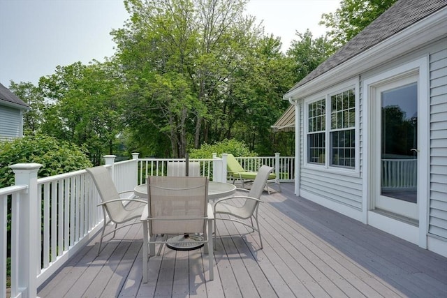 244 Salem End Rd, Framingham, MA 01702 - wooden terrace with outdoor dining space and view of wooded area