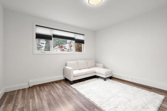 20 Pleasant View Ave, Everett, MA 02149 - living area featuring baseboard heating and wood finished floors