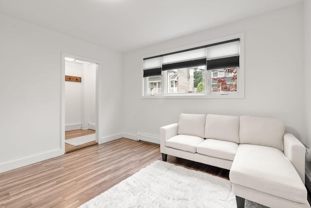 20 Pleasant View Ave, Everett, MA 02149 - living room featuring light wood-type flooring and baseboard heating