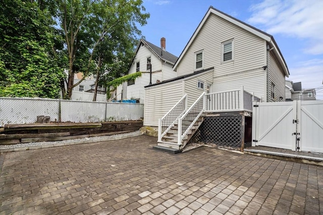 20 Pleasant View Ave, Everett, MA 02149 - back of house with a gate, a patio, a fenced backyard, stairway, and a wooden deck