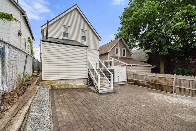 20 Pleasant View Ave, Everett, MA 02149 - back of house featuring a patio area, a fenced backyard, and stairs