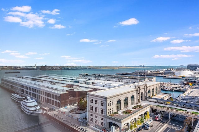 birds eye view of property featuring a water view