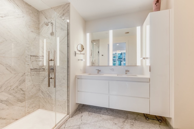 bathroom with an enclosed shower and vanity