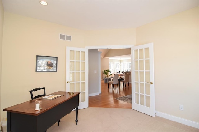 carpeted home office featuring recessed lighting, visible vents, baseboards, and french doors